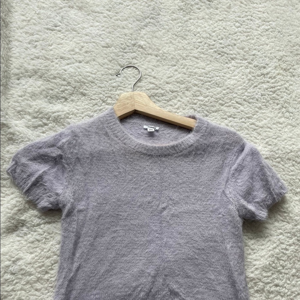 Garage sweater top with fur finish in size M